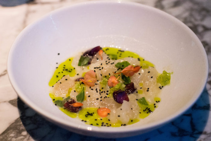 Le Turtle Crudo Black bass crudo, whey, bing cherry, celery caviar & basil - $16