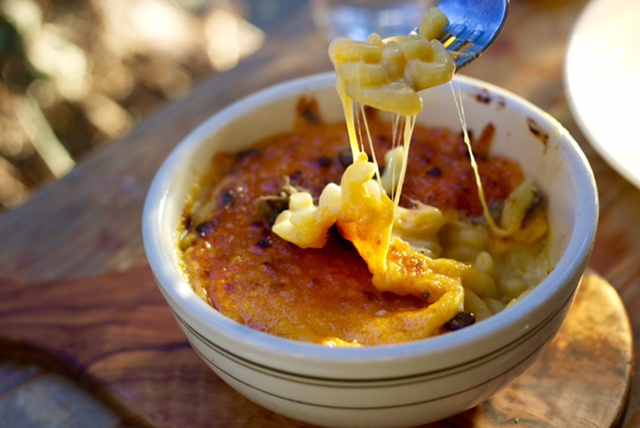 Attacking the Maccheroni Tartufo - black truffle carpaccio, mac & cheese.