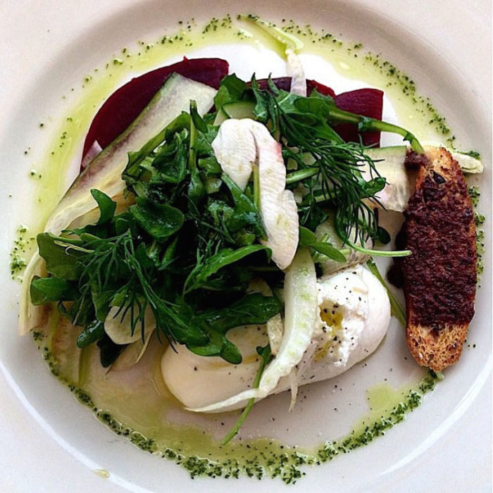 Grand Banks Burrata with Chianti vinegar marinated beets, fennel, arugula, cucumber, basil, chive oil and olive crouton