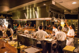 Momofuko Ko dining room chef's counter open kitchen