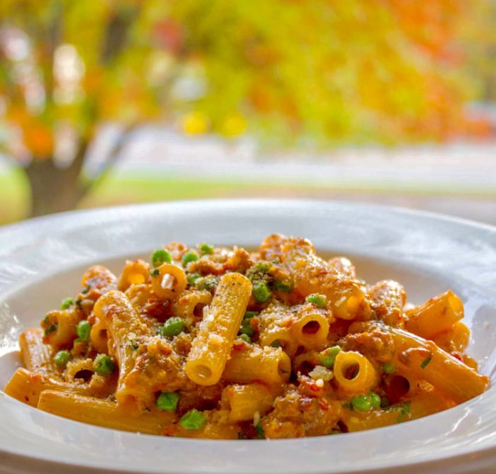 Cucina woodstock Signature pasta dish: rigatoni, sausage, peas, cream, spicy tomato ($20)