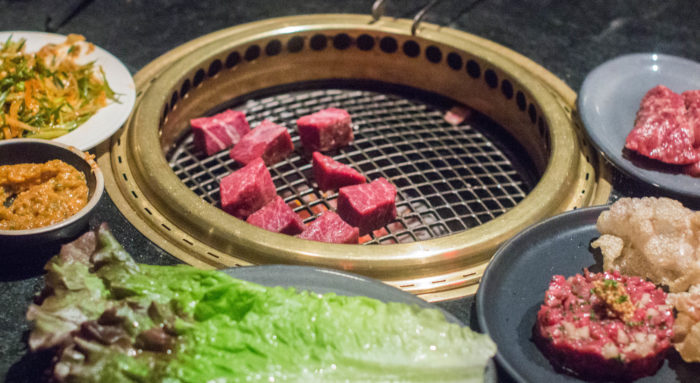 Cooking the Prime Beef after greasing the grill with beef lard 