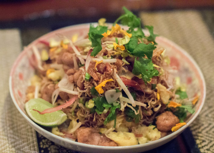 Kob Woonsen. Garlic & soy marinated frog legs over glass noodle, lemongrass & thai herb salad. $16.00